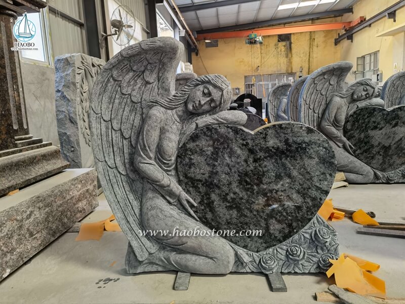 olive green granite angel gravestone