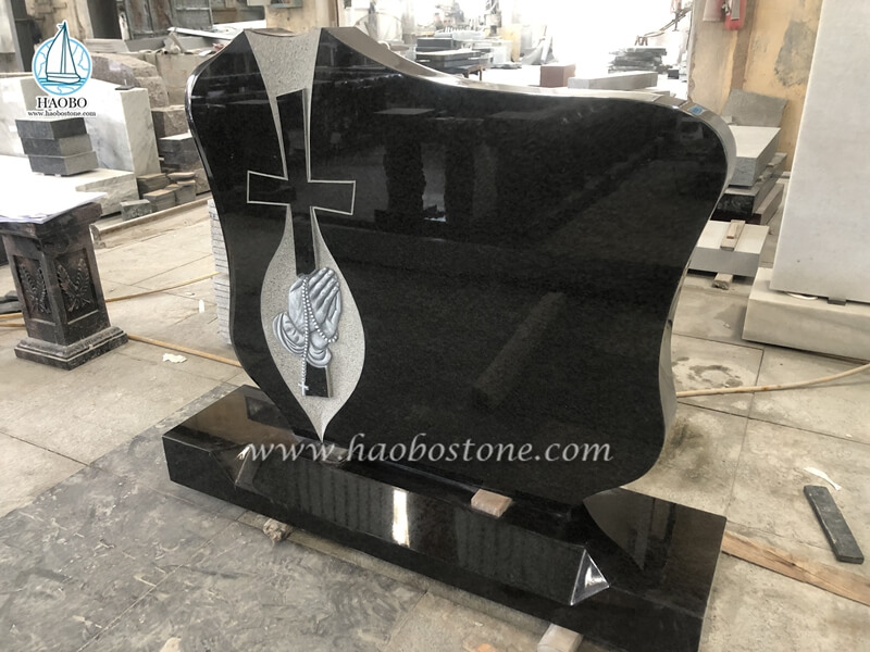 black granite cross gravestone