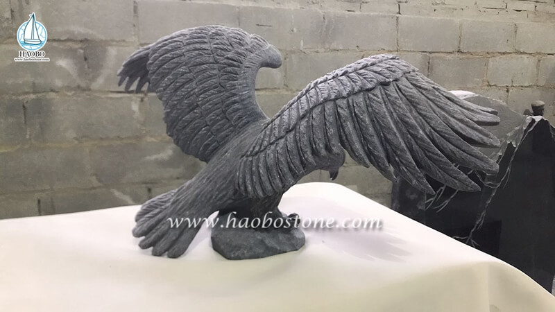 stone carved eagle sculpture