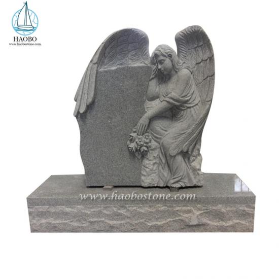 Winged Angel Holds Rose Carved Tombstone