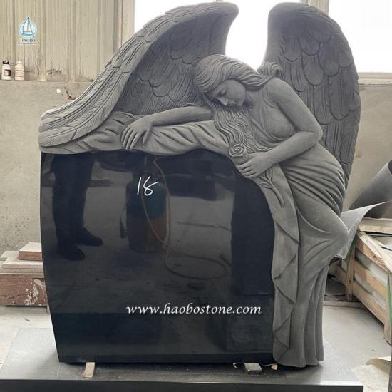 Grey Granite Winged Weeping Angel Holding Floral Carved  Headstone